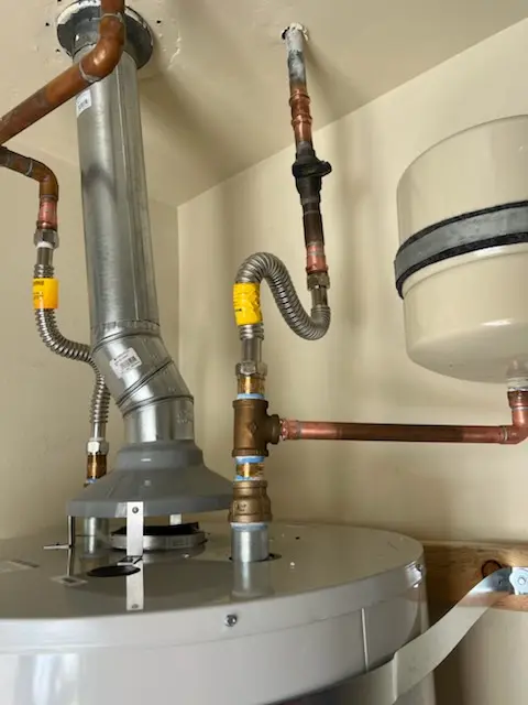 Water heater installation and plumbing repair in Elma